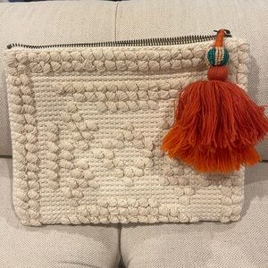 Handcrafted Cream Clutch with Orange Tassel